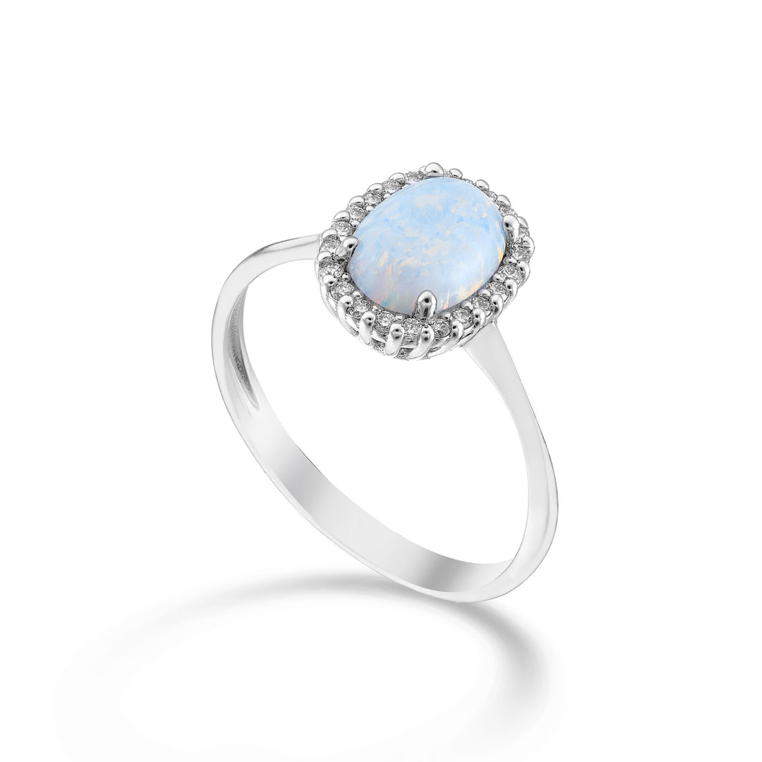 Nihama an 18k opal cabochon oval 8x6, with diamond outline NA5208O4OP