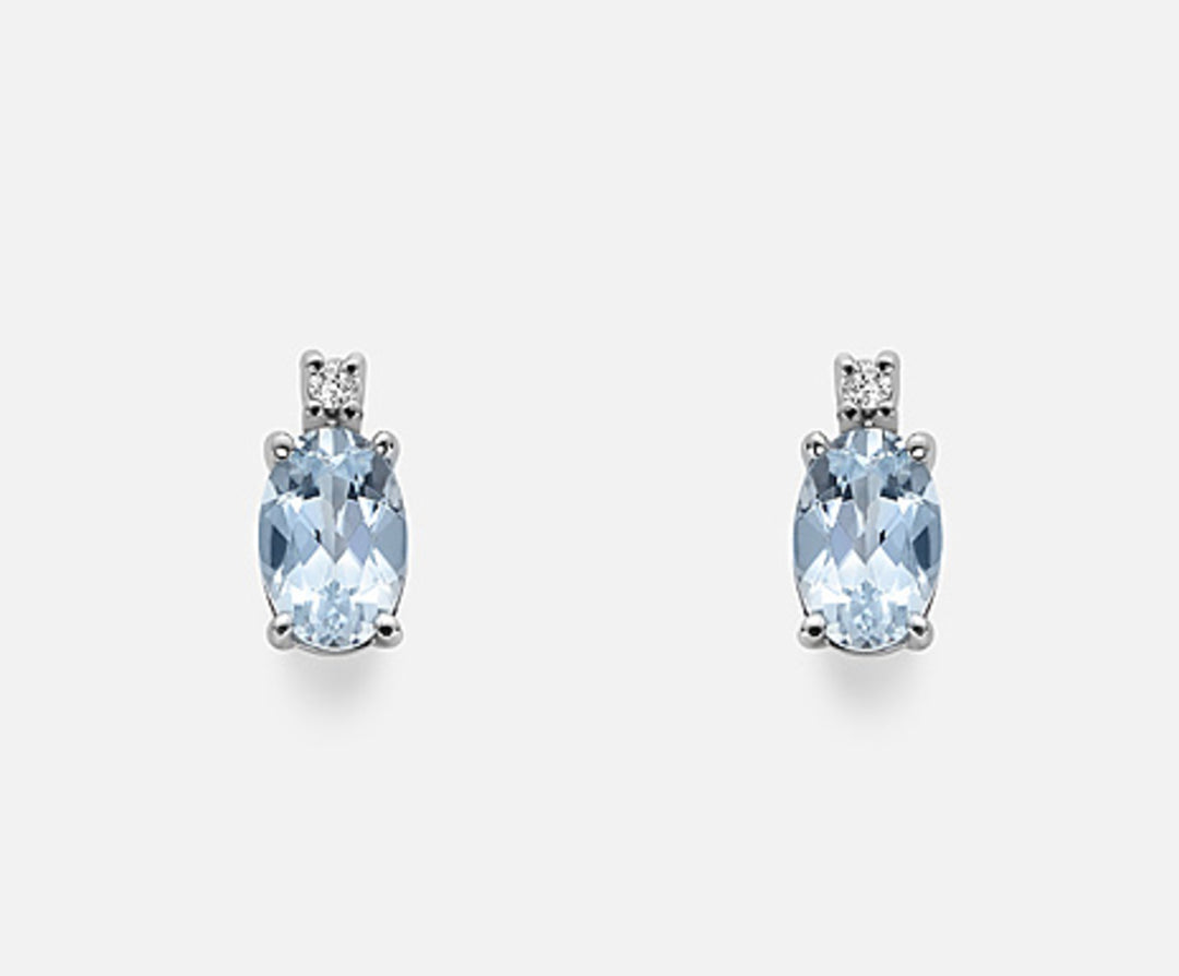 Nihama ou aigue-marine ovale 9k 6x4 ct.0,60 diam. 0,02 ctNO5023R4AM
