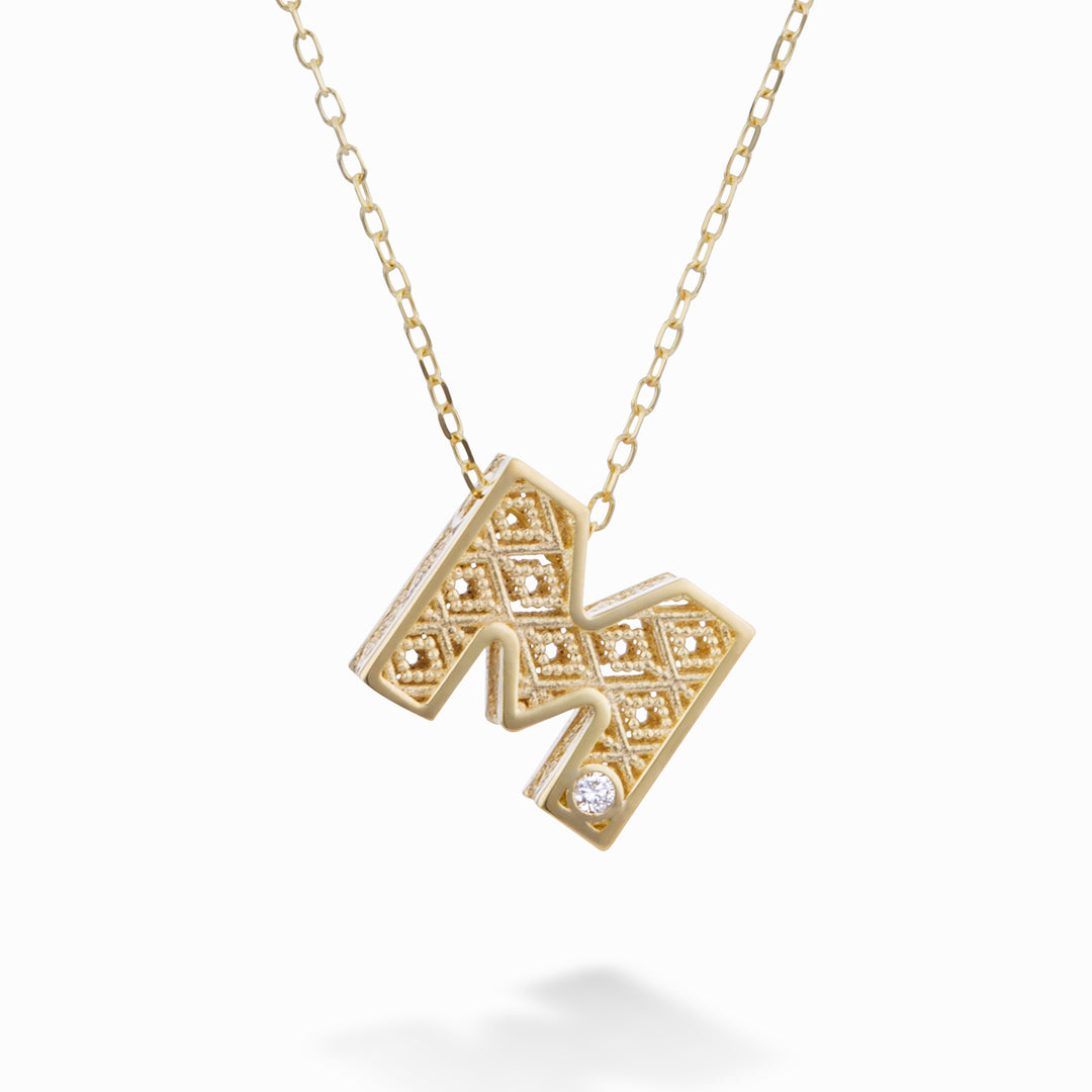 Mikiko cl 18k letter m yellow gold diam. ct.0.01 MDLETMO1