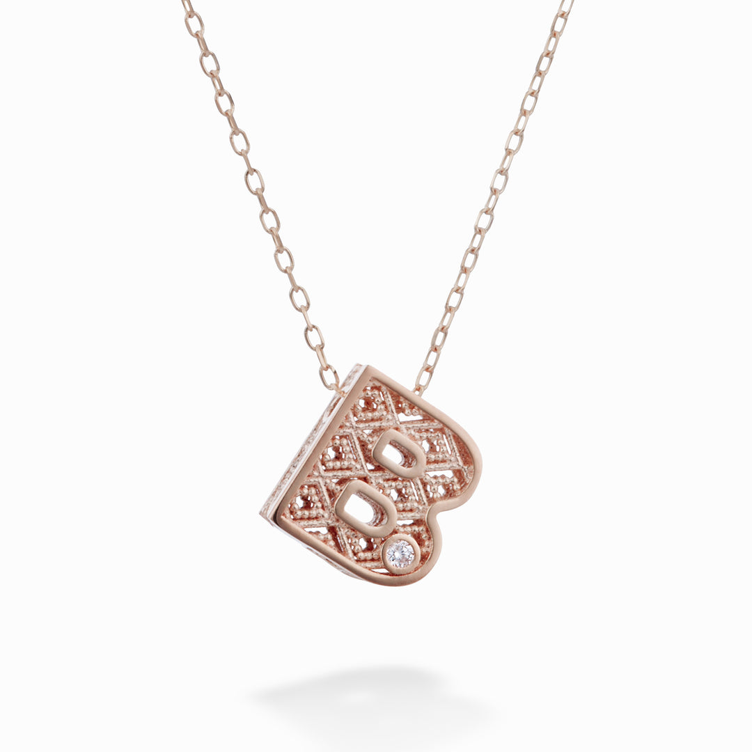 Nihama cl 18k lettera b oro rosè diam. ct.0,01 NDLETBO3