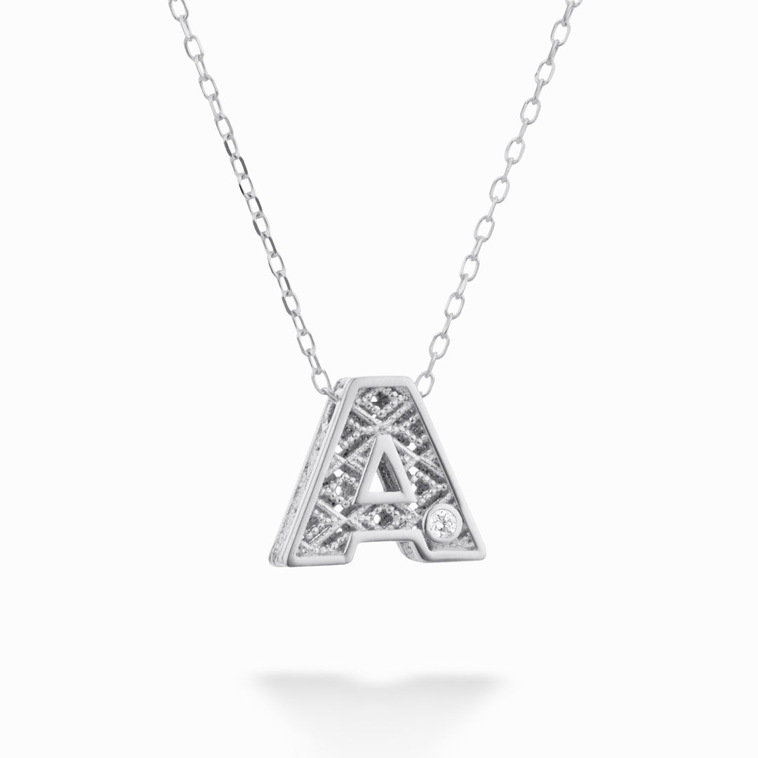 Nihama cl Lettre en or blanc 18 carats diam. ct.0,01 NDLETAO4