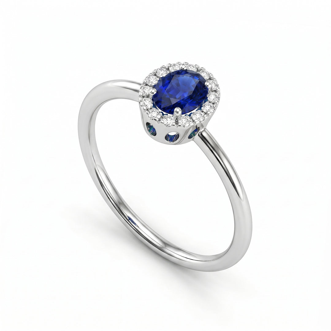 Nihama, ein 18 Karat ovaler Saphir 5x4 mit Diamantkontur und glattem Schaft NA5234O4ZFD