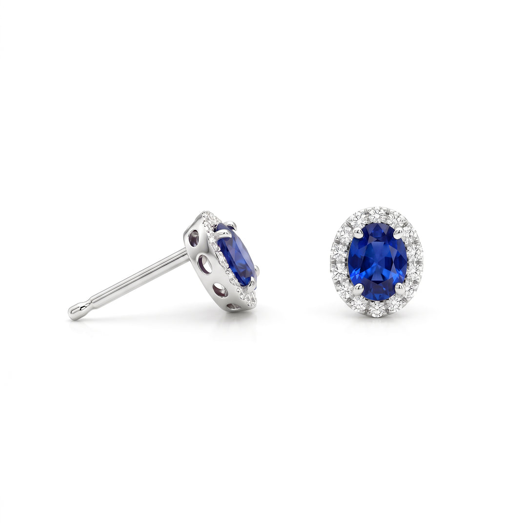 Nihama or 18k oval sapphire 5x4 with diamond outline NO5184O4ZFN