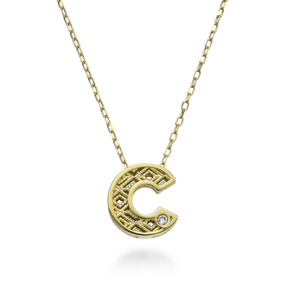 Mikiko cl 18k letter c yellow gold diam. ct.0,01 MDLETCO1