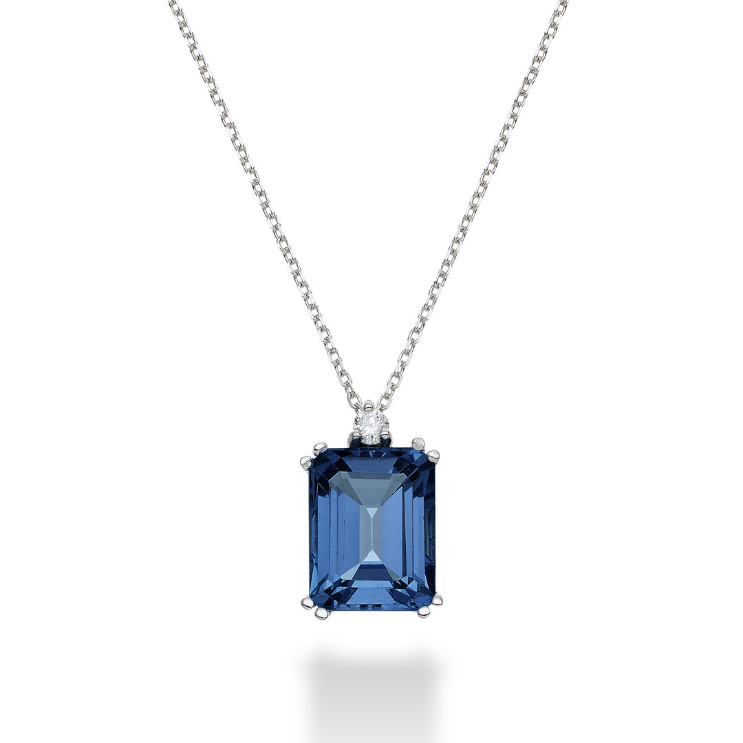 Nihama cl 18k achteckiger Londoner Blautopas 7x9 ct.2,65 Durchm. ct.0,04 NPCL090DITPBL4O4