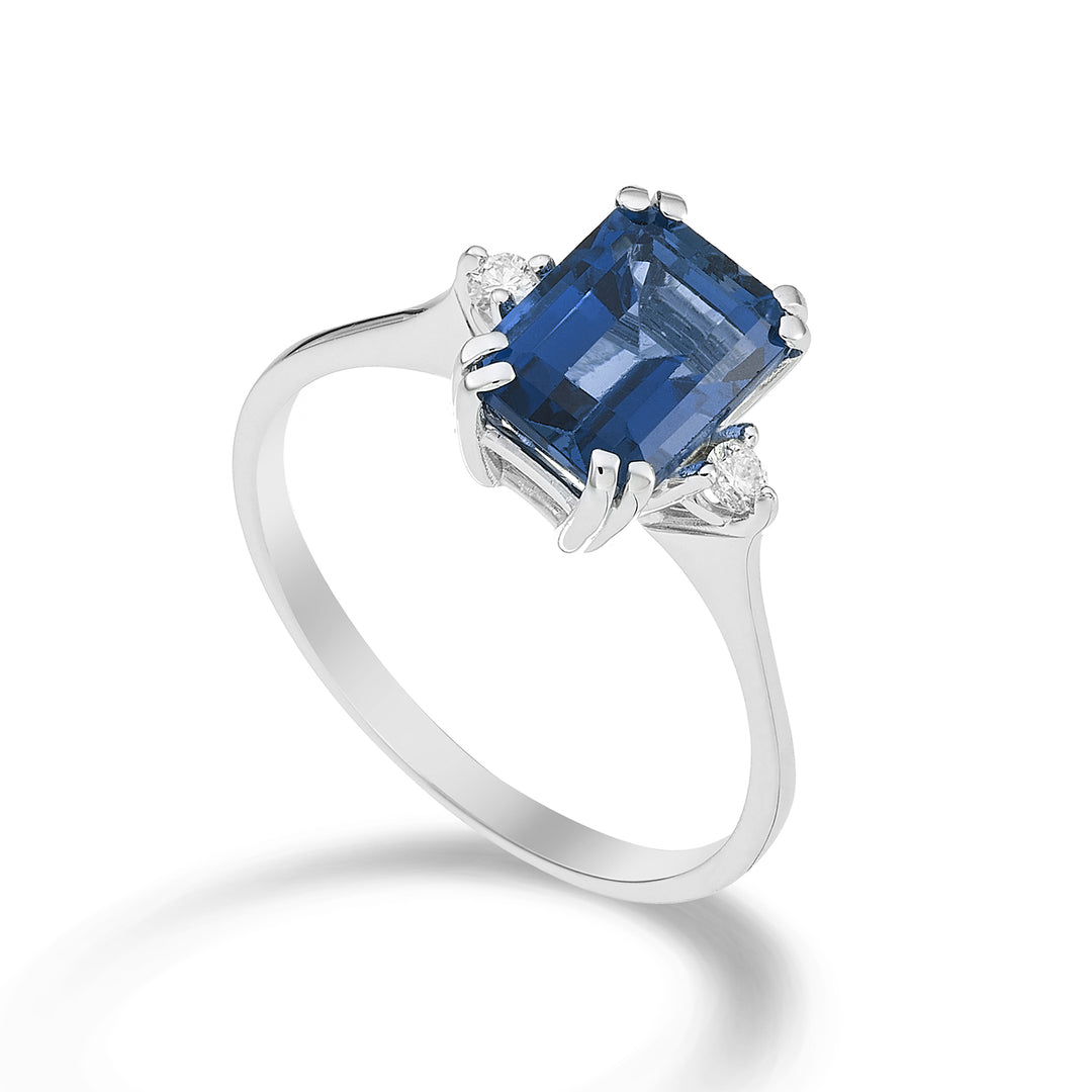 Mikiko an 18k octagonal London blue topaz 8x6 ct.2.65 diam. ct.0,06 MACL090DITPBL3O4