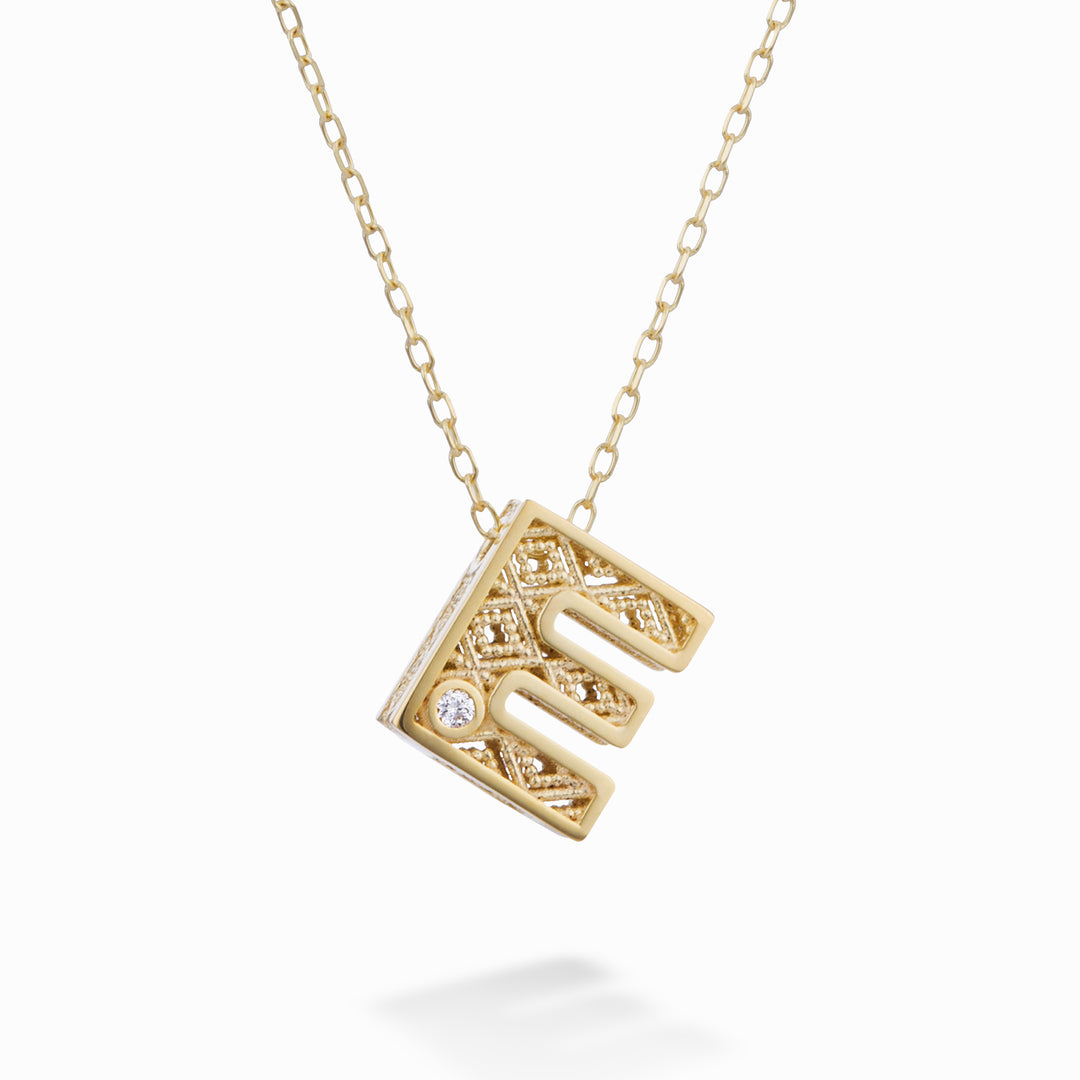 Nihama cl 18k lettera e oro giallo diam. ct.0,01 NDLETEO1