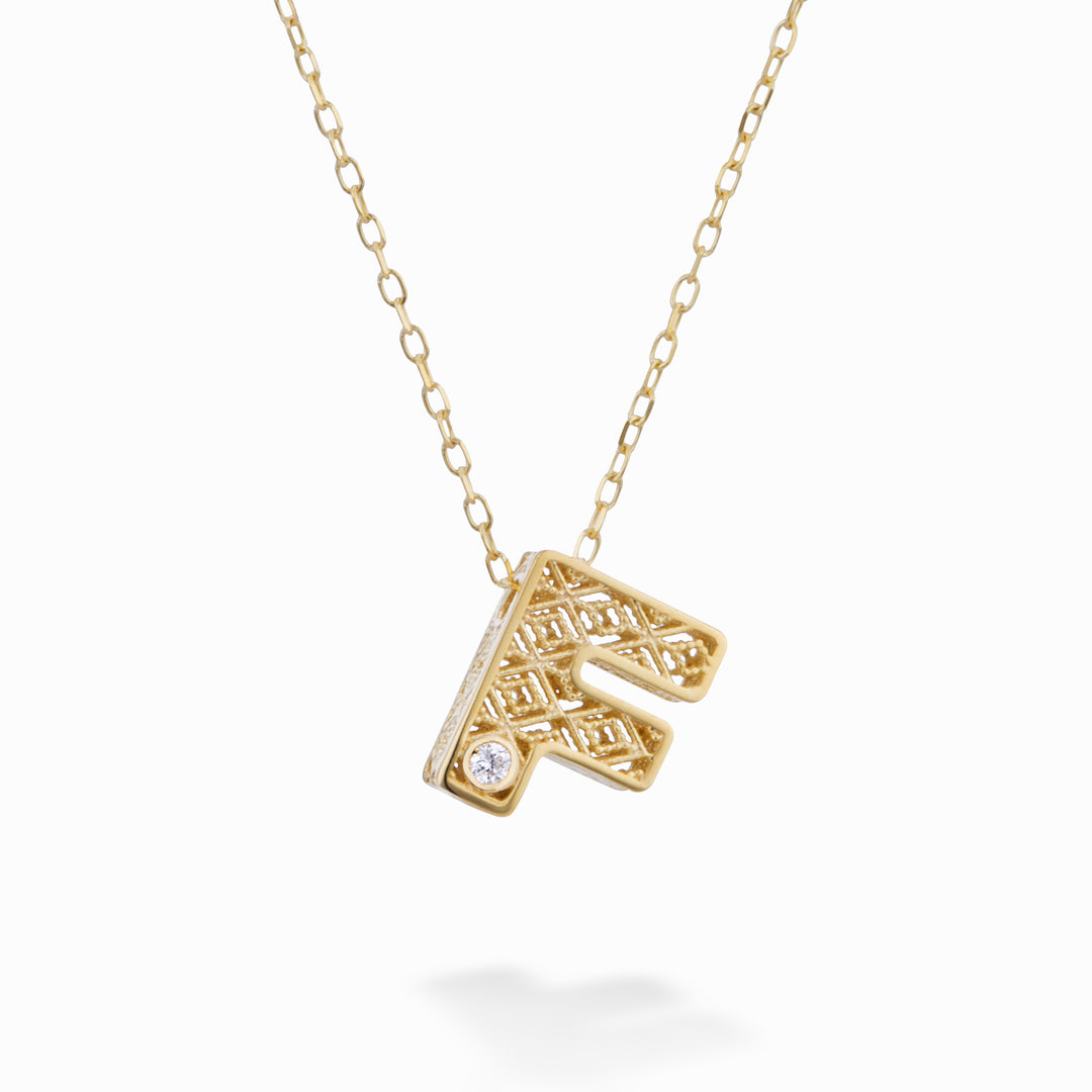 Mikiko cl lettre f en or jaune 18 carats diam. ct.0,01 MDLETFO1