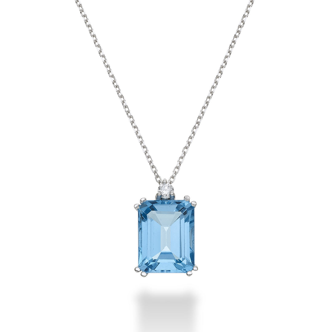 Mikiko cl 18k achteckiger blauer Topas 7x9 ct.2,90 Durchm. ct.0,04 MPCL090DITPAZ4O4