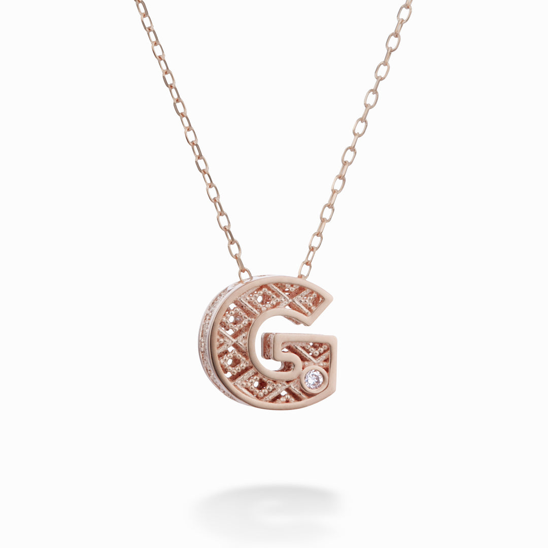 Nihama cl 18k lettre g or rose diam. ct.0,01NDLETGO3