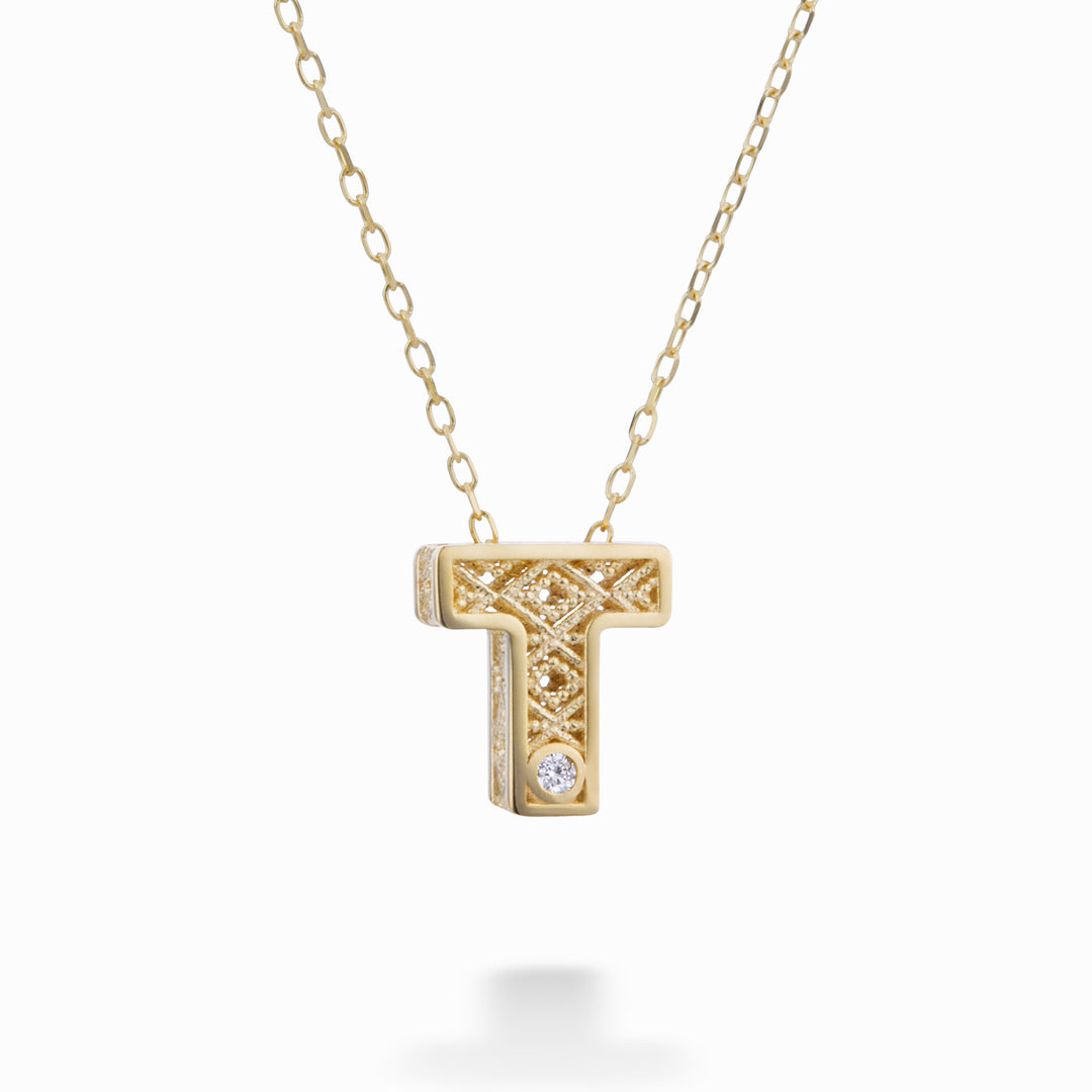 Mikiko cl 18k letter t yellow gold diam. ct.0,01 MDLETTO1