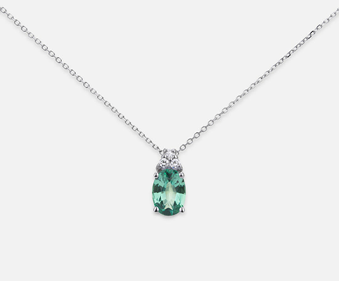 Nihama cl 18k oval emerald 7x5 ct.0.60 dia ct.0.045 ND5055O4BE