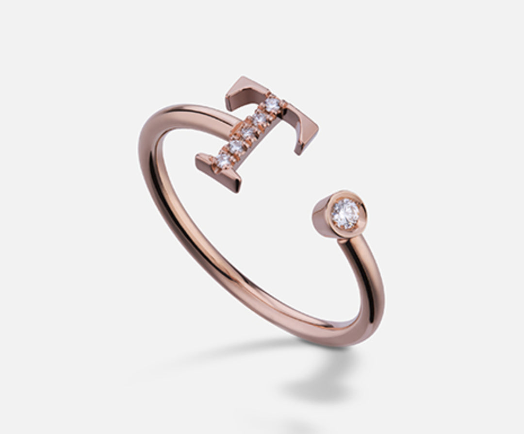 Golay une lettre t 9k grand diamètre en or rose. ct.0,06 GAFTD2R3