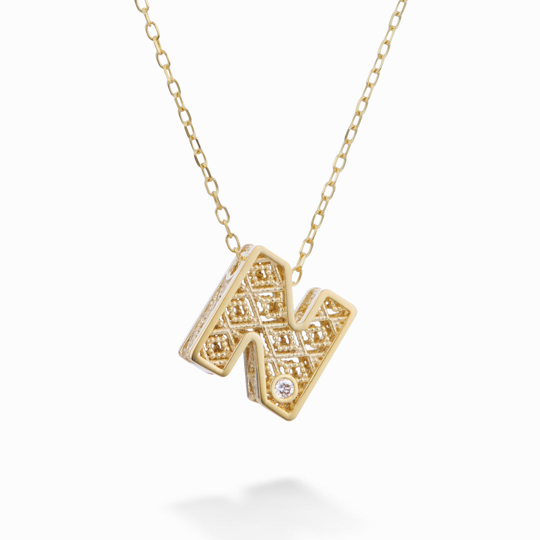 Nihama cl 18k Buchstabe N Gelbgold Durchm. ct.0,01 NDLETNO1