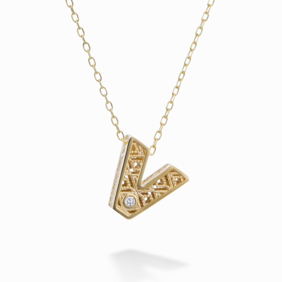 Nihama cl 18k lettre v or jaune diam. ct.0,01 NDLETVO1