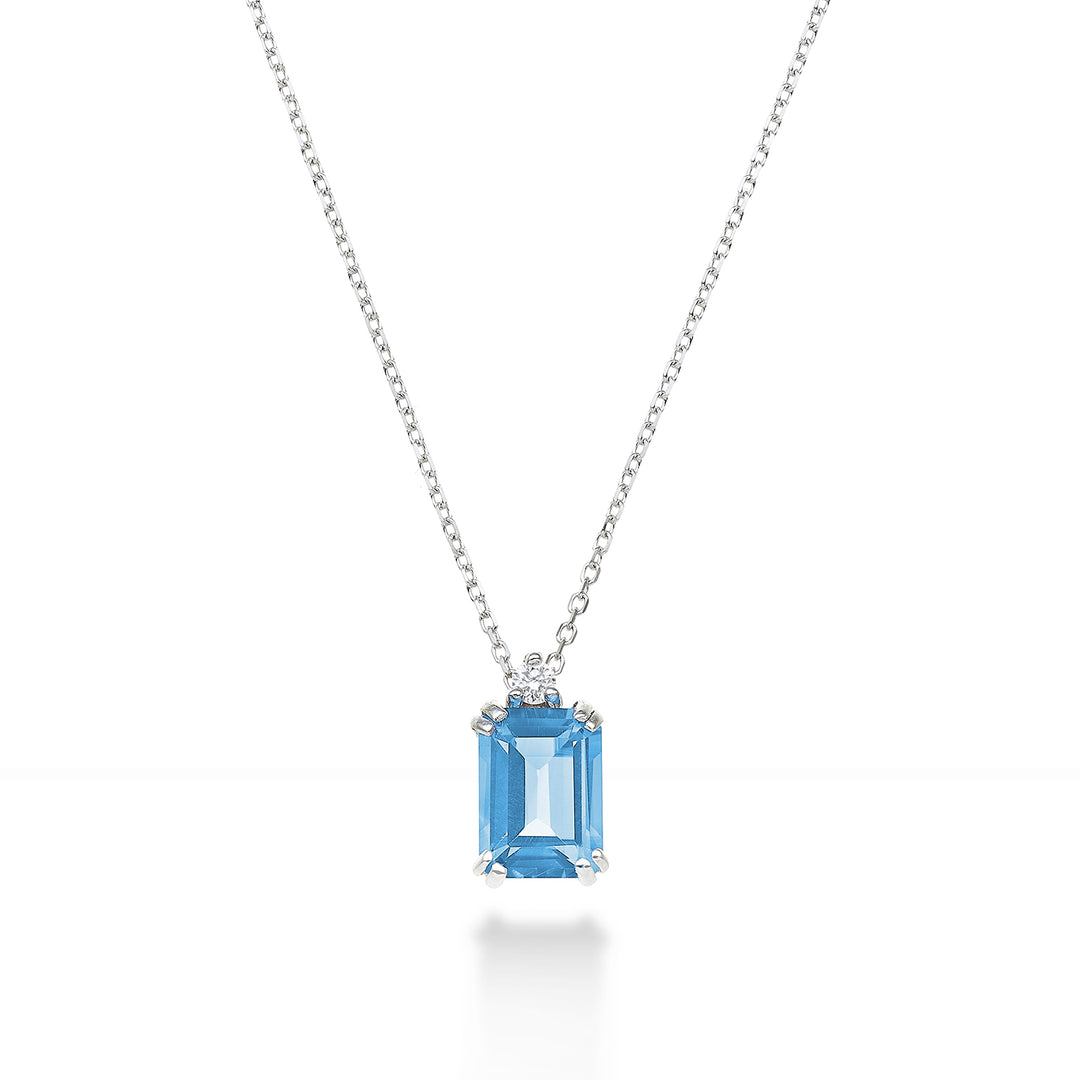 Mikiko cl 18k topazio azzurro ottagonale 7x5 ct.1,20 diam. ct.0,025 MPCL090DITPAZ2O4