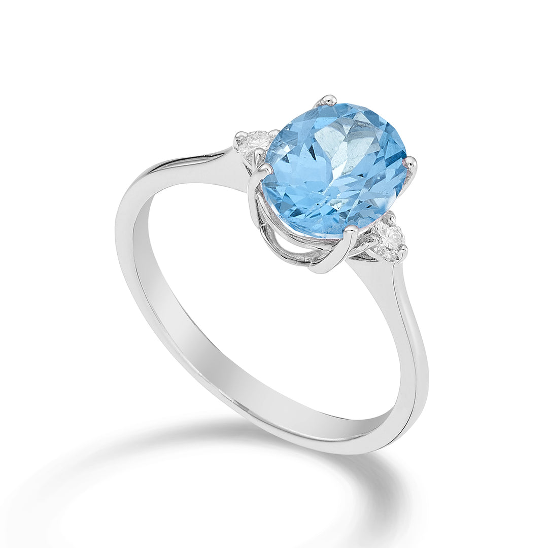 Nihama, ein ovaler Blautopas aus 18 Karat, 7x9 ct.2,10 Durchm. ct.0,08 NA5143O4TPAZ