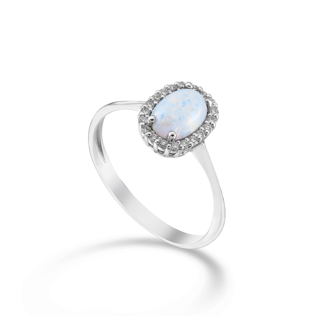 Nihama, ein 18-Karat-Opal-Cabochon, oval, 7 x 5, mit Diamantkontur NA5207O4OP
