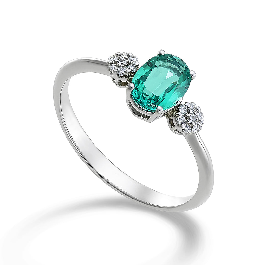 Mikiko an 18k oval emerald 7x5 ct.0,60 diam. ct.0.08 MA5058O4BE