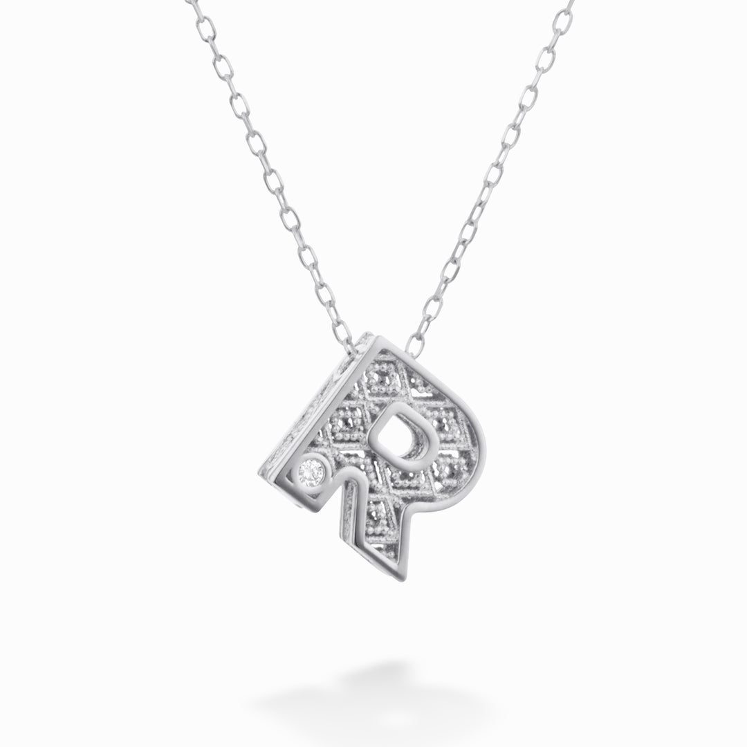 Nihama cl 18k lettre r or blanc diam. ct.0,01 NDLETRO4