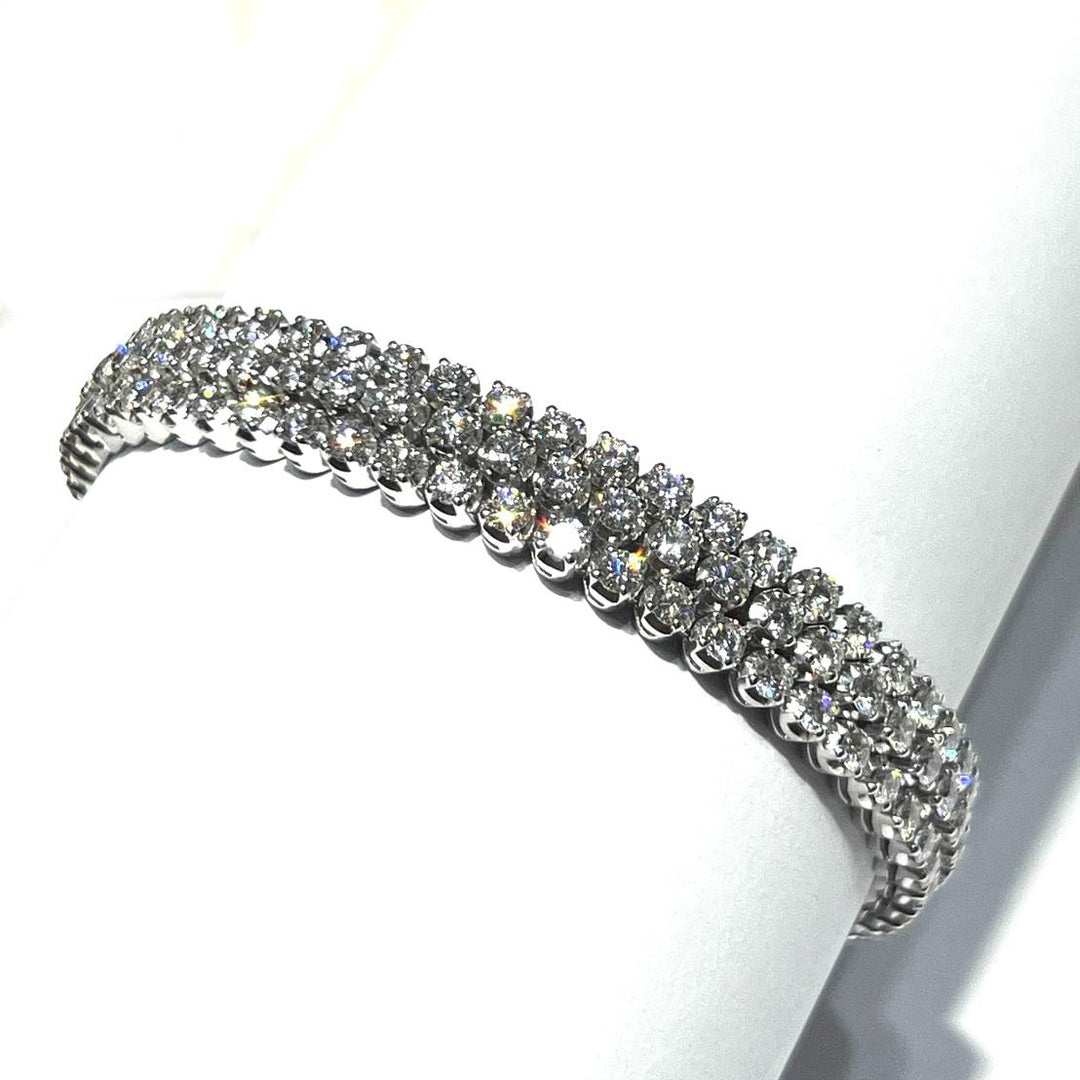 Tennisarmbandlinsen aus 18-karätigem Gold mit drei Diamanten FCBT02890